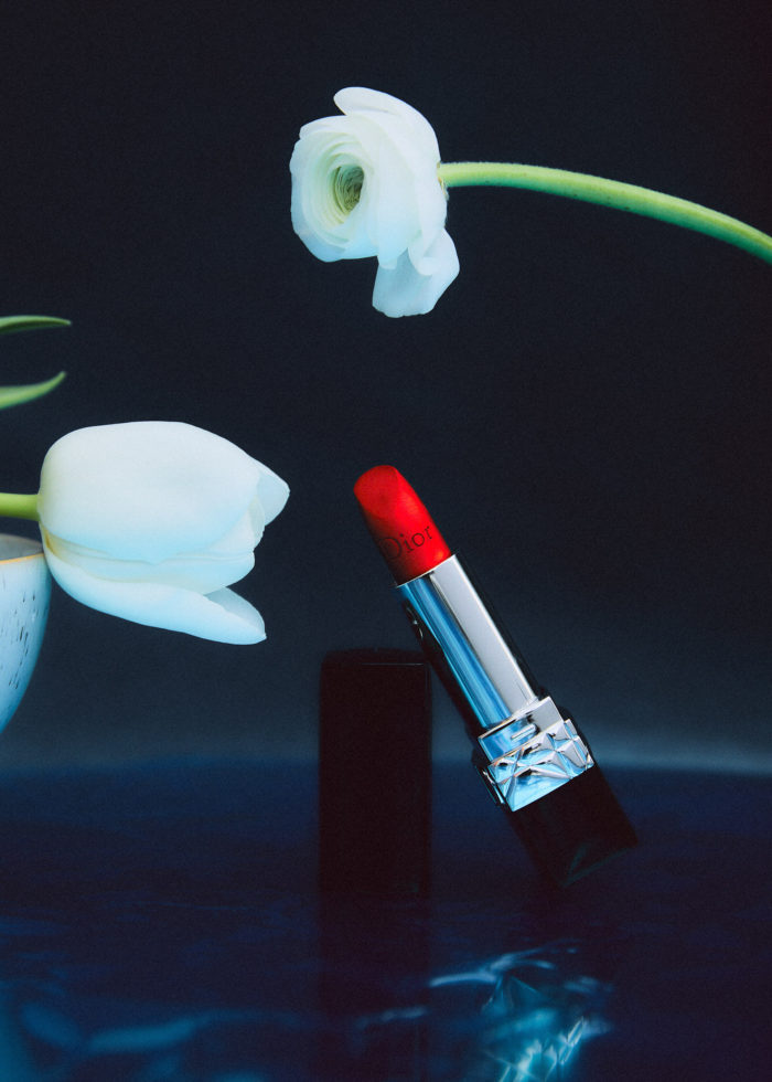 Product shoot with florals with Dior lipstick