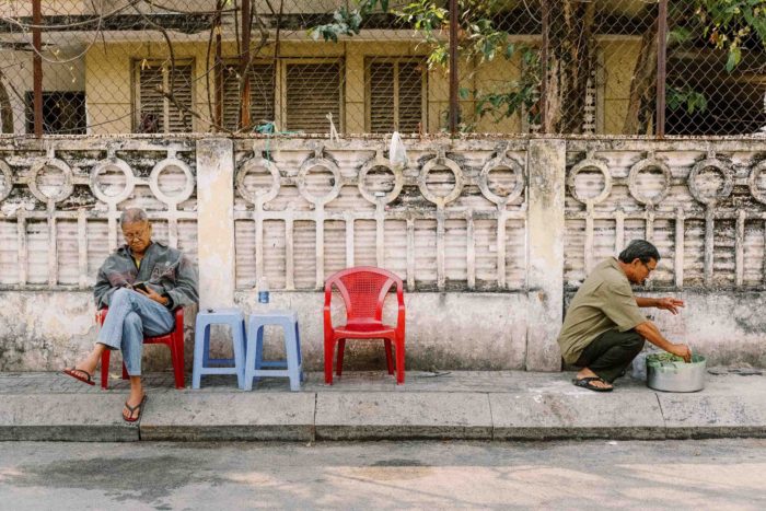 Travel photography, Ho Chi Minh City, Vietnam, men in street cooking